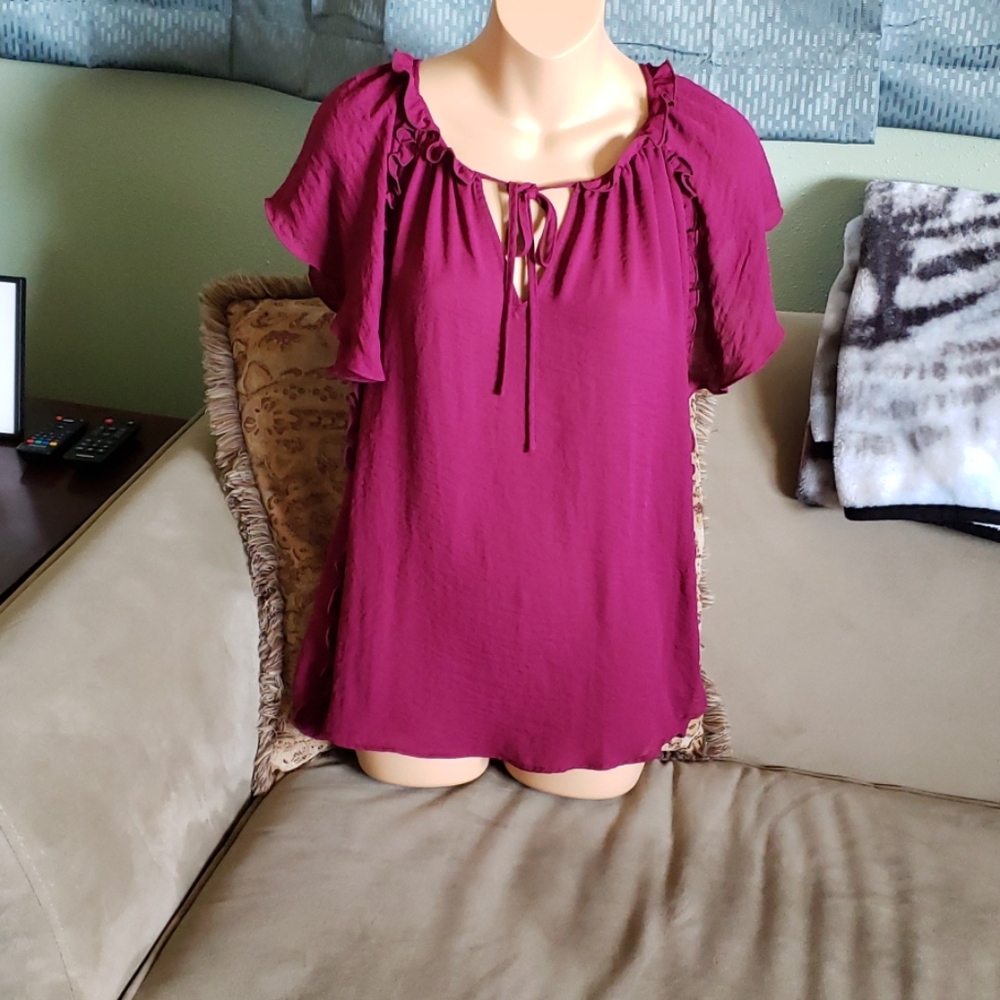 Beautiful ruffled top with tie neckline